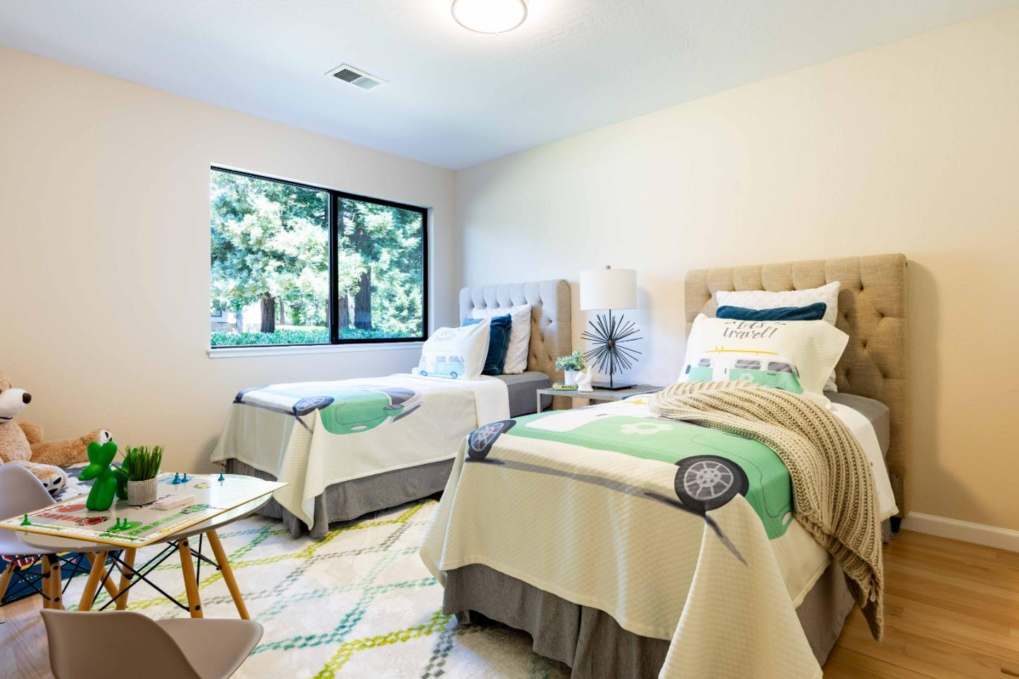 1655 Grant Road Mountain View, CA 94040 - Photo 14 of 24 a bedroom with two beds and painted walls