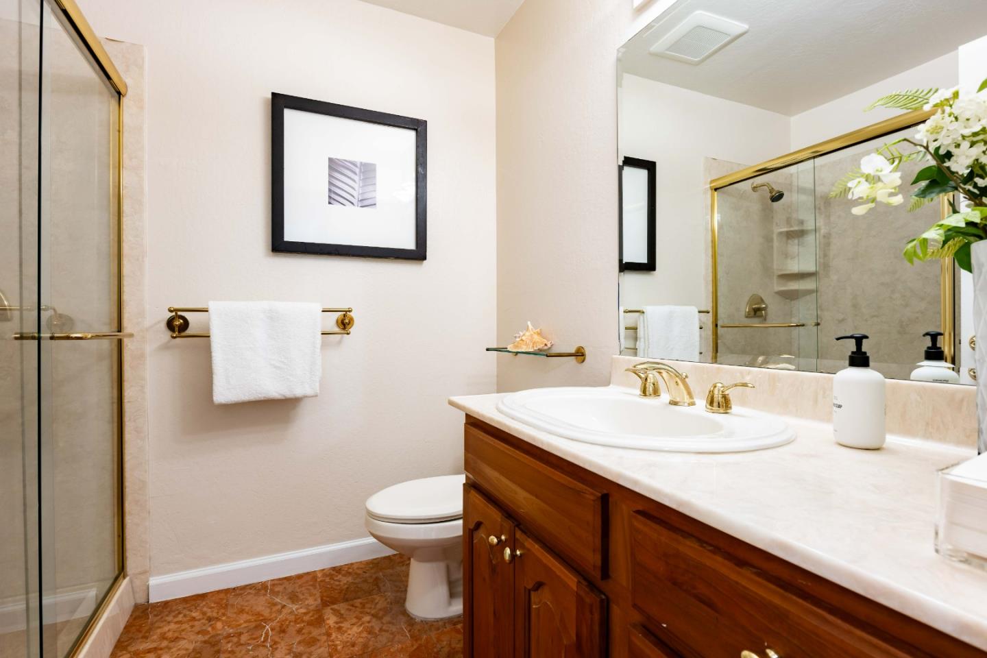 1655 Grant Road Mountain View, CA 94040 - Photo 16 of 24 a bathroom with a sink a toilet and mirror