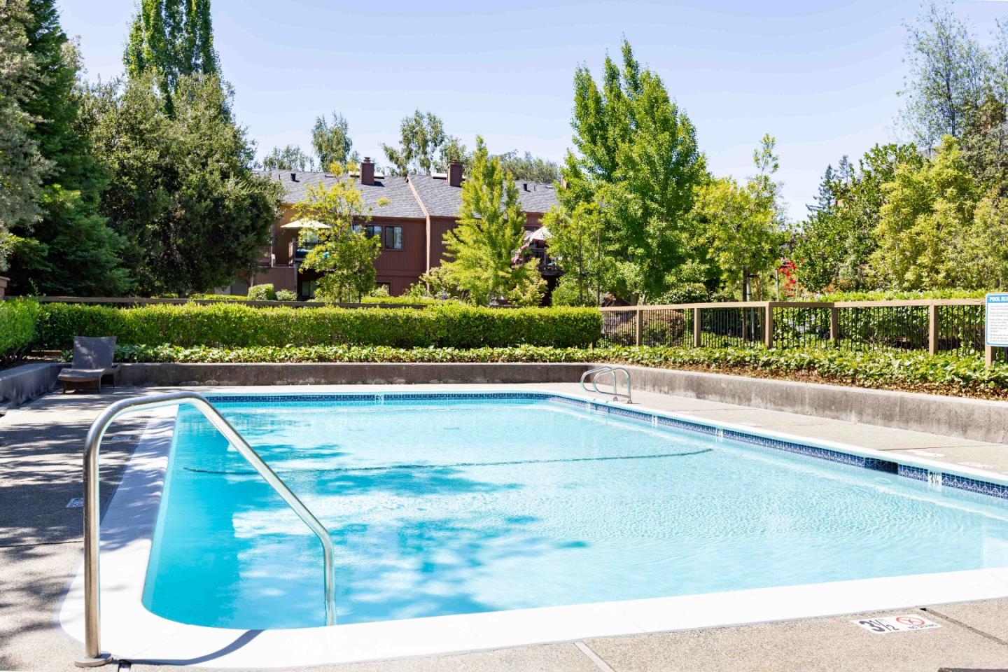 1655 Grant Road Mountain View, CA 94040 - Photo 21 of 24 a view of a swimming pool with a yard and plants