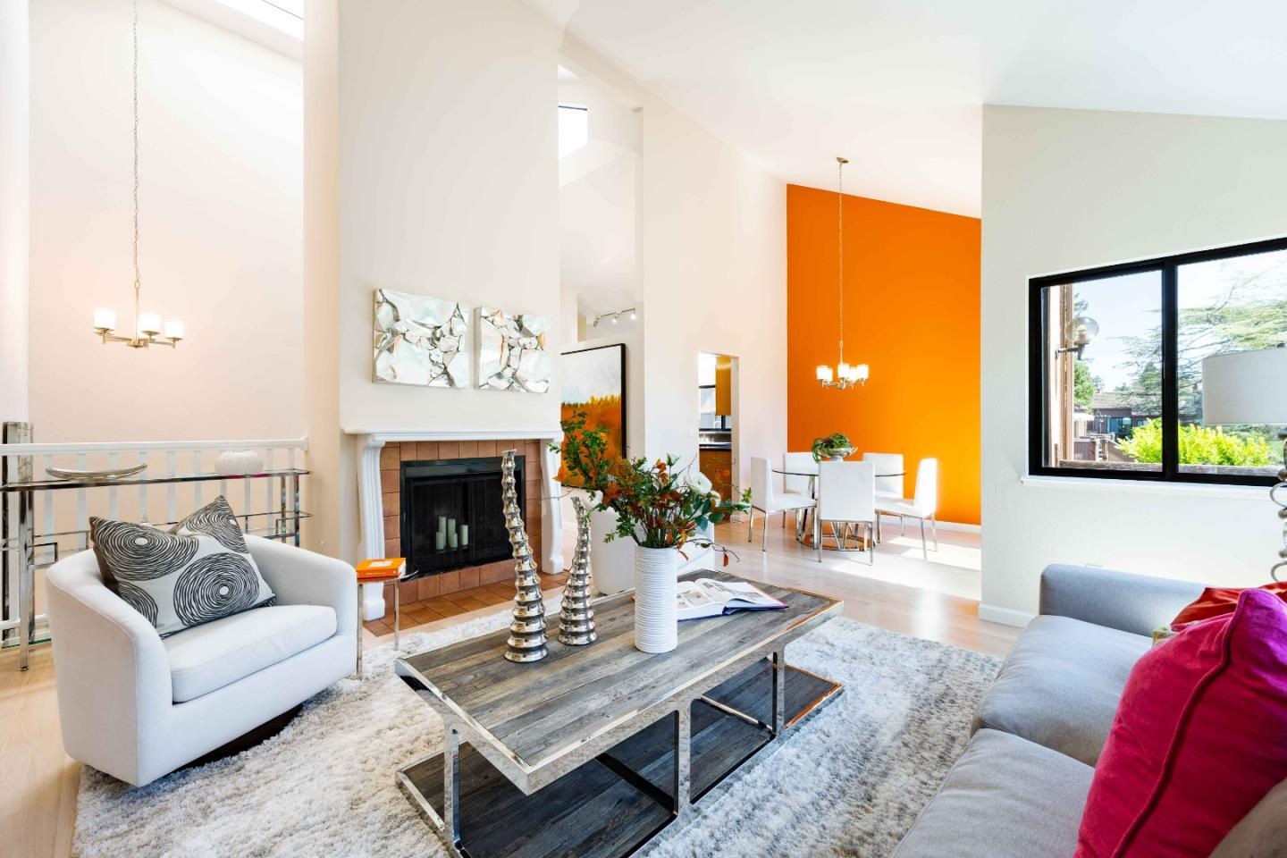 1655 Grant Road Mountain View, CA 94040 - Photo 3 of 24 a living room with furniture and a fireplace