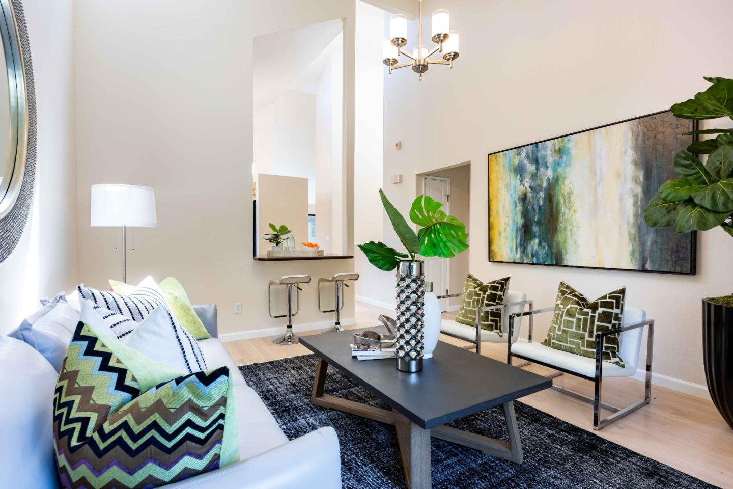 1655 Grant Road Mountain View, CA 94040 - Photo 10 of 24 a living room with furniture and a potted plant