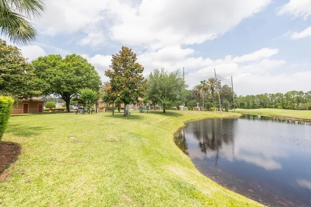 a view of a swimming pool and lake