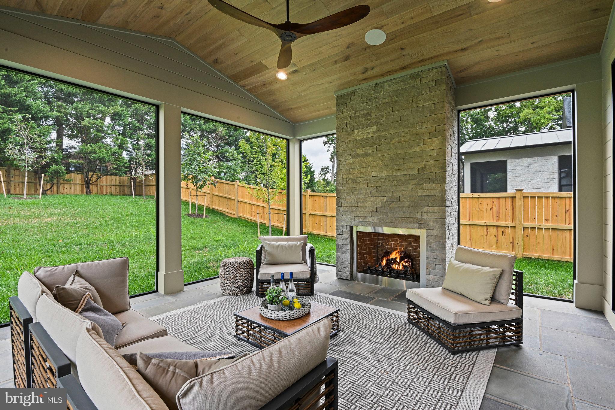 1109 Ingleside Avenue McLean, VA 22101 - Photo 17 of 94 a outdoor living space with patio furniture and a fireplace