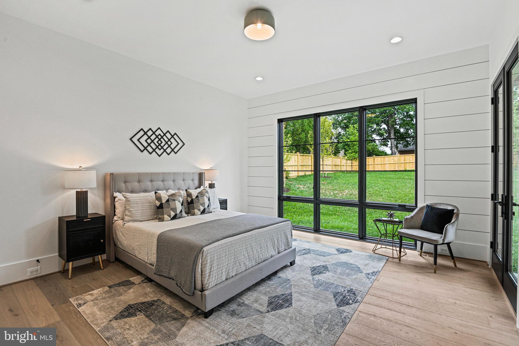 1109 Ingleside Avenue McLean, VA 22101 - Photo 24 of 94 a bedroom with a bed and a large window