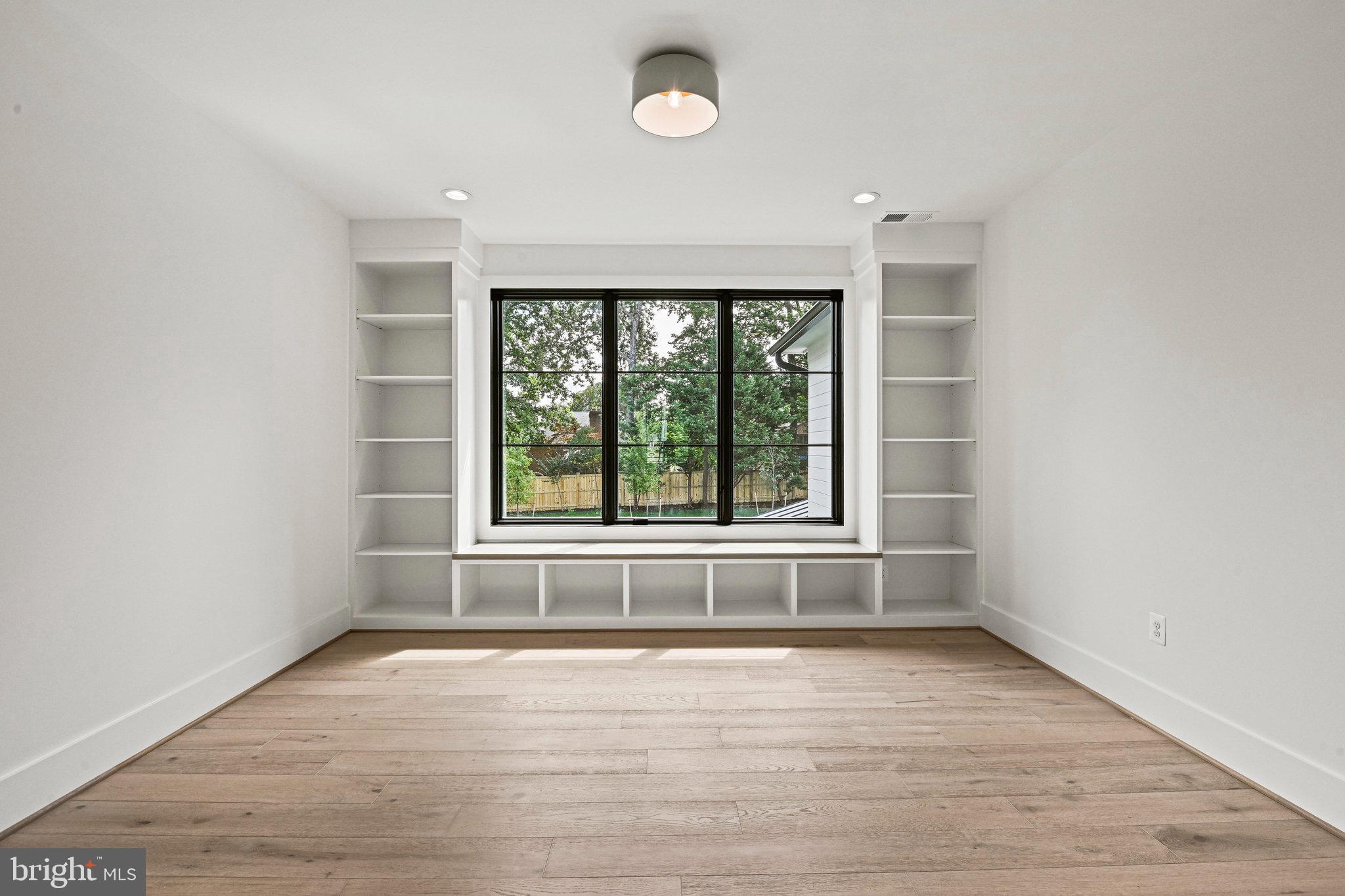 1109 Ingleside Avenue McLean, VA 22101 - Photo 46 of 94 wooden floor in an empty room with a window