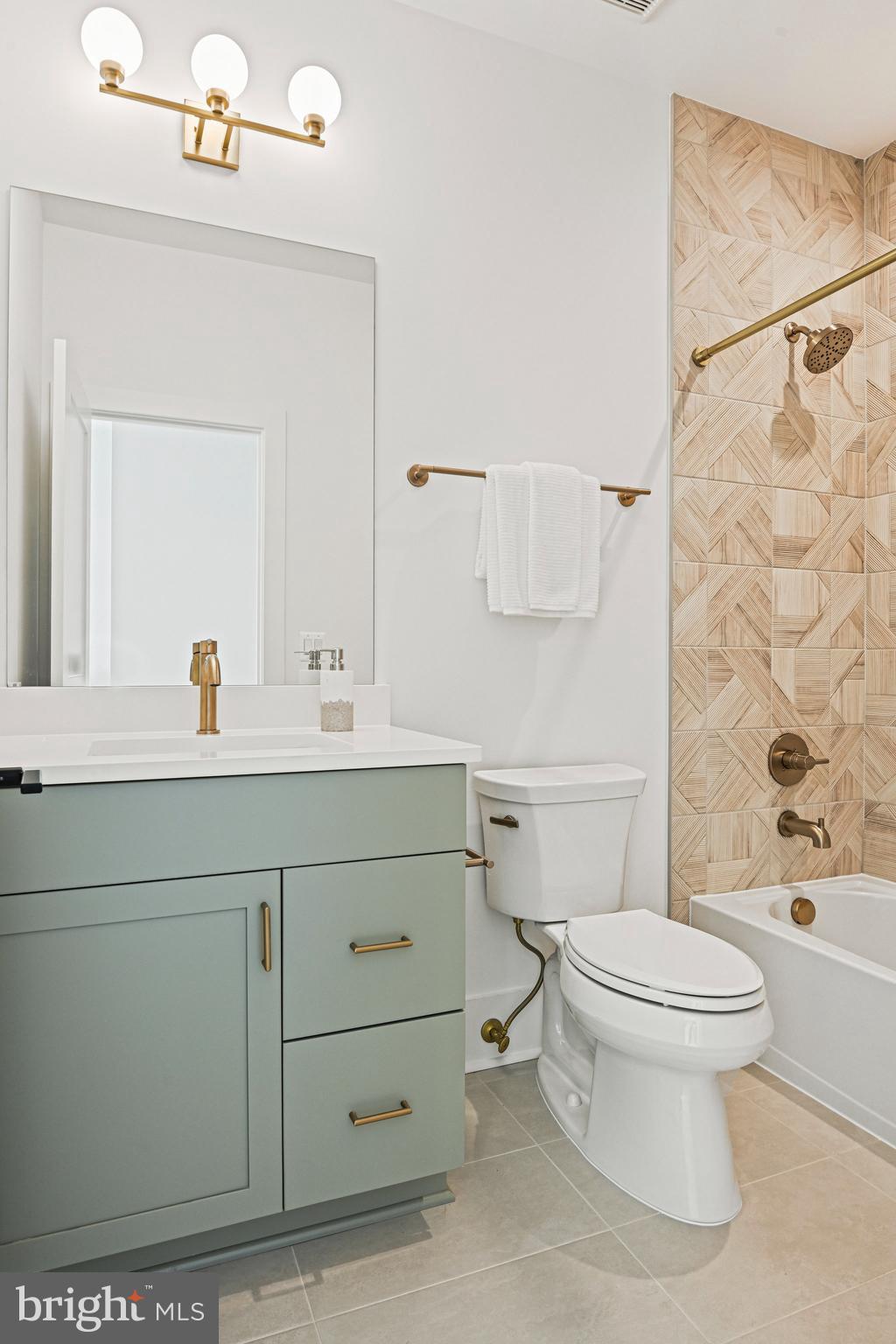 1109 Ingleside Avenue McLean, VA 22101 - Photo 50 of 94 a bathroom with a sink toilet and shower
