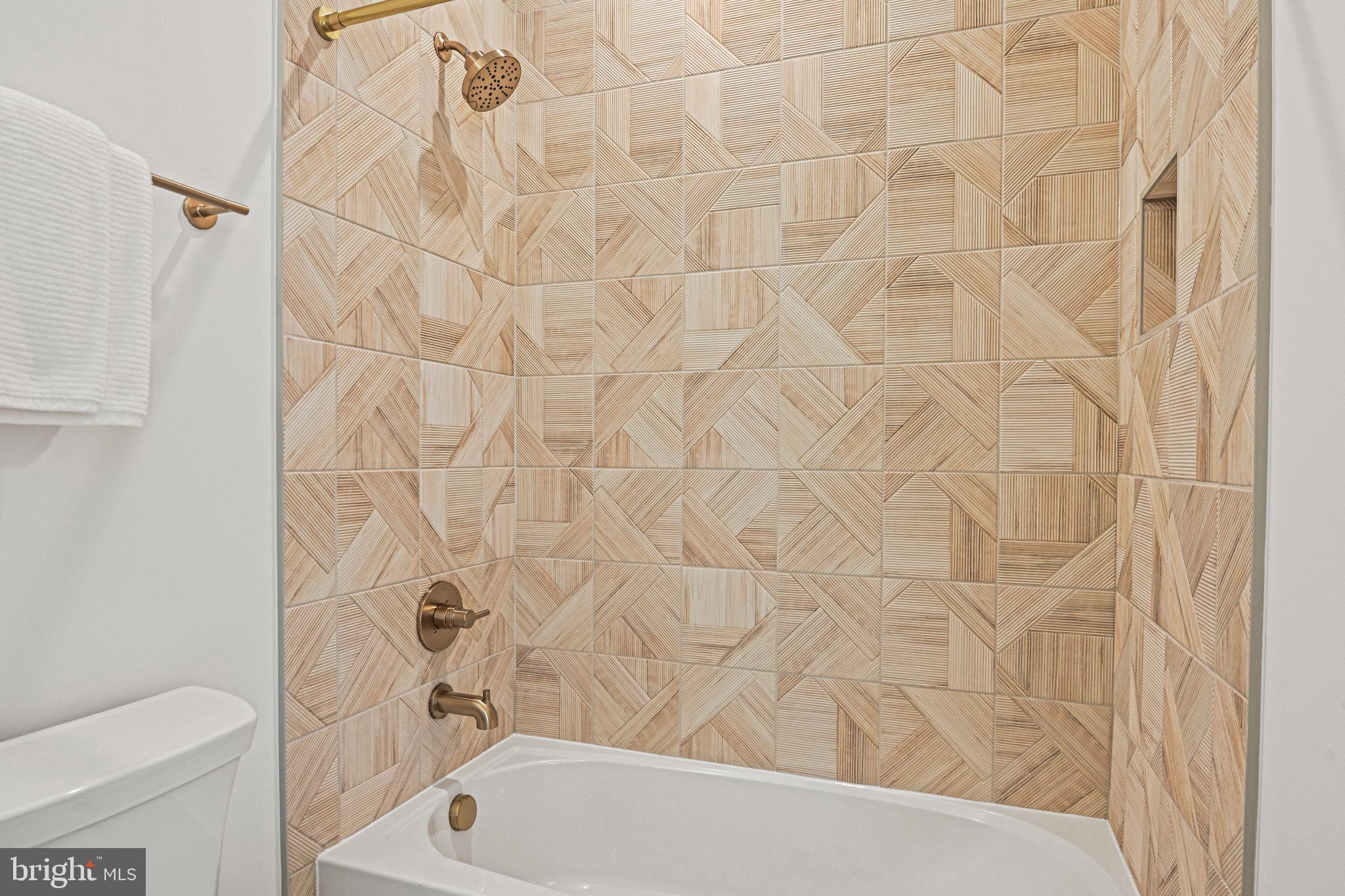 1109 Ingleside Avenue McLean, VA 22101 - Photo 51 of 94 a bathroom with a bathtub and shower