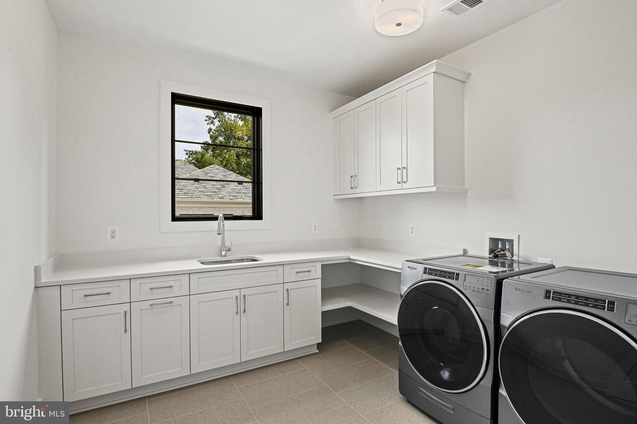 1109 Ingleside Avenue McLean, VA 22101 - Photo 59 of 94 a utility room with sink dryer and washer