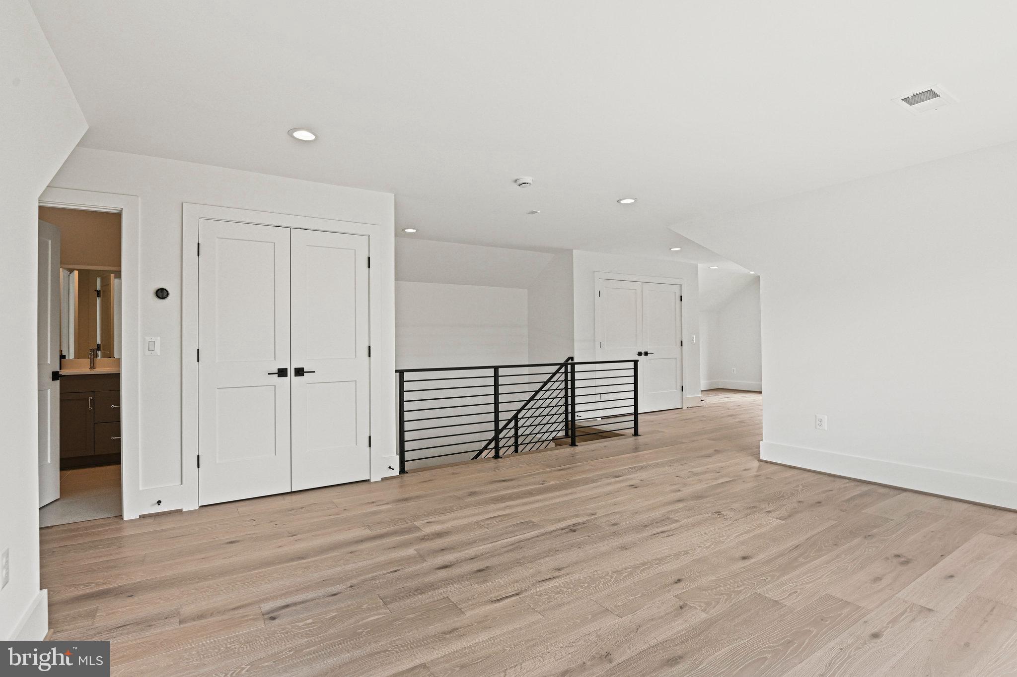 1109 Ingleside Avenue McLean, VA 22101 - Photo 67 of 94 a view of an empty room with wooden floor