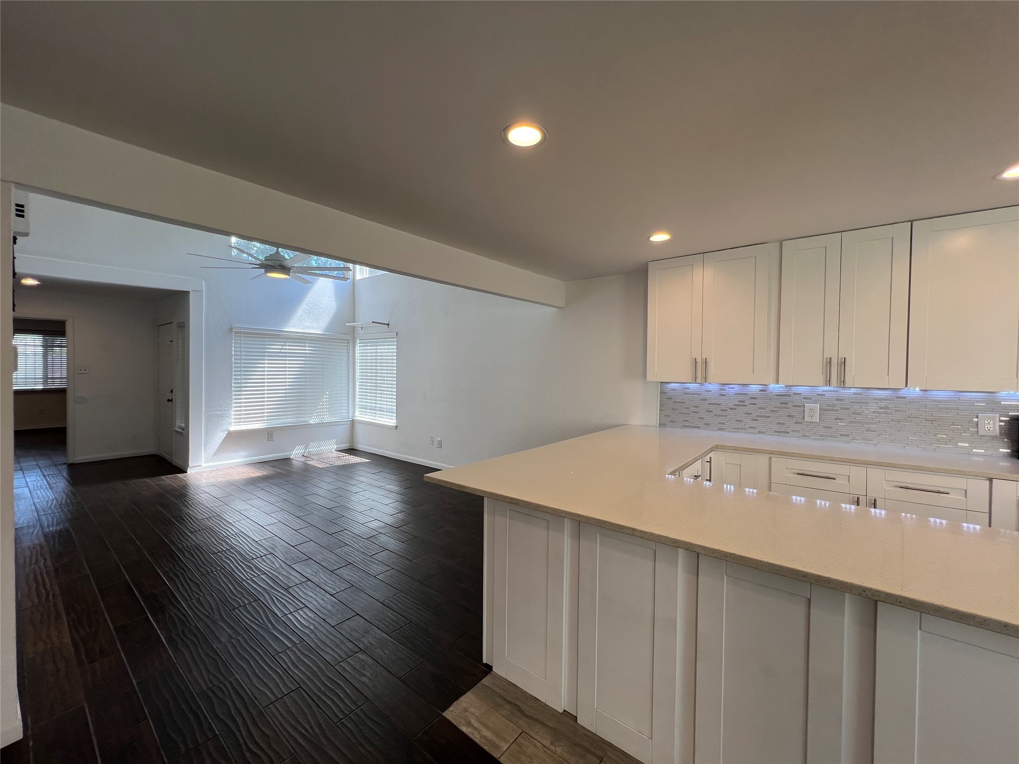 2372 Woodland Park Drive, Unit 121 Houston, TX 77077 - Photo 13 of 47 a view of a kitchen with a sink and a microwave
