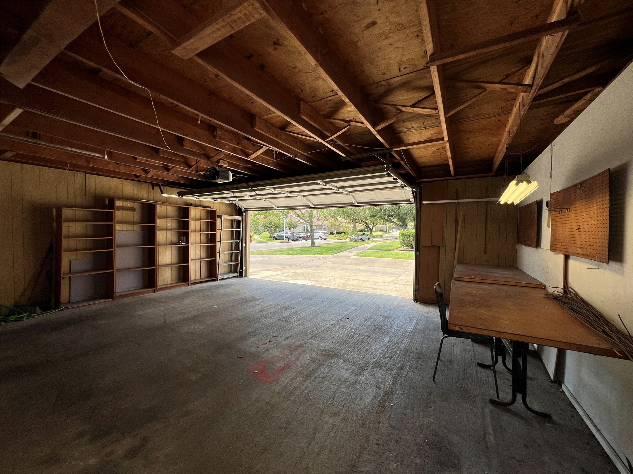 2372 Woodland Park Drive, Unit 121 Houston, TX 77077 - Photo 45 of 47 a view of a room with wooden walls