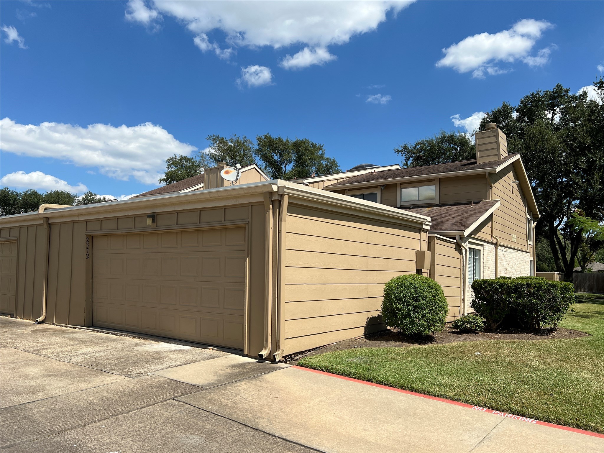 2372 Woodland Park Drive, Unit 121 Houston, TX 77077 - Photo 7 of 47 a view of a back yard of the house