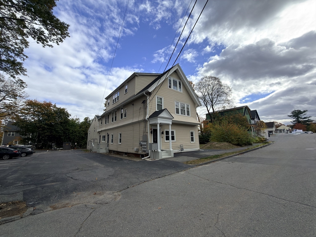 91 Alvarado Avenue, Unit 8 Worcester, MA 01604 - Photo 1 of 26 a view of a house with a yard
