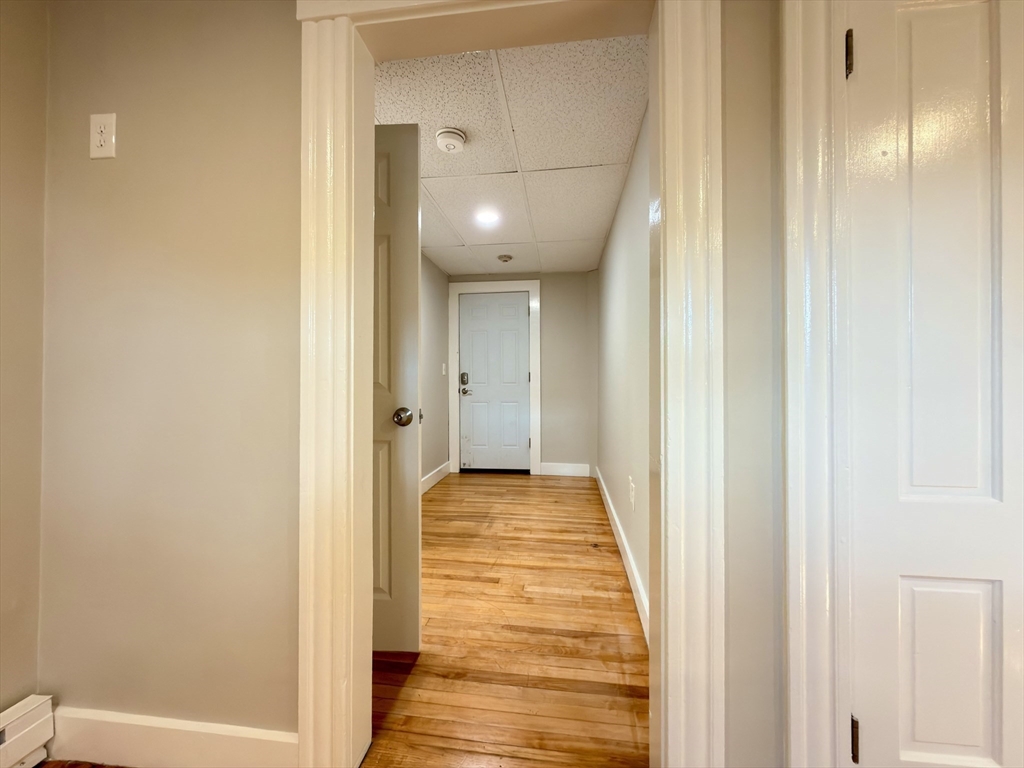 91 Alvarado Avenue, Unit 8 Worcester, MA 01604 - Photo 18 of 26 a view of hallway with wooden floor