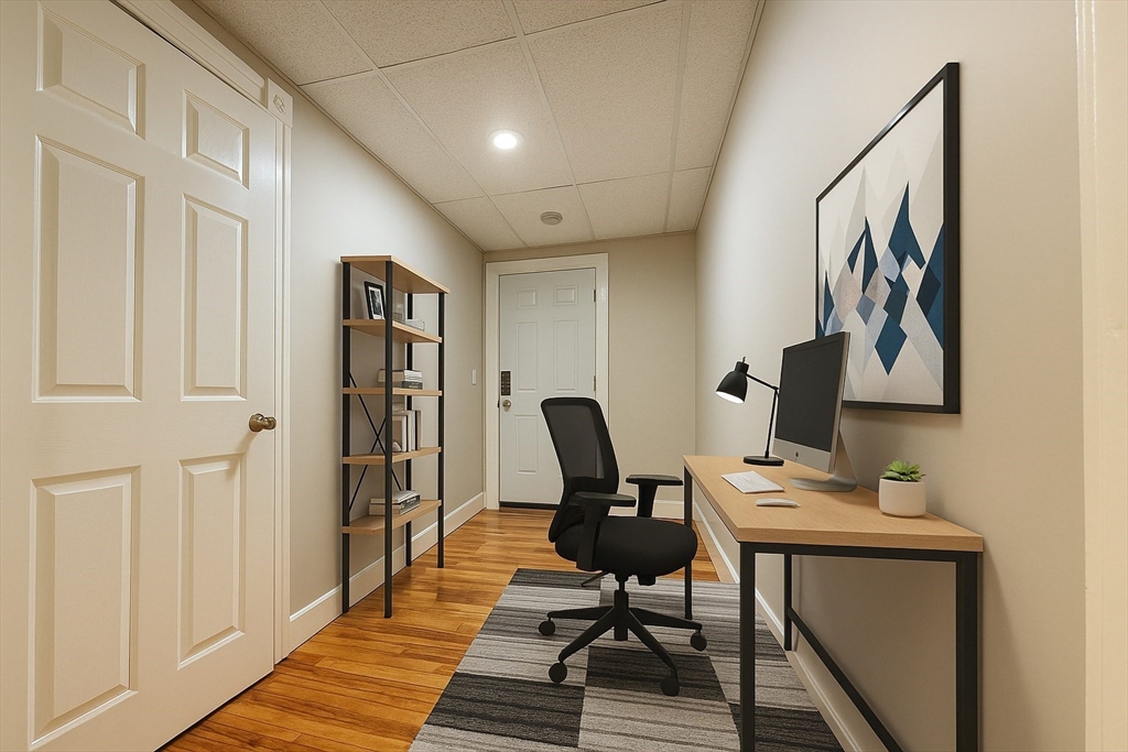 91 Alvarado Avenue, Unit 8 Worcester, MA 01604 - Photo 20 of 26 a workspace with furniture and rug