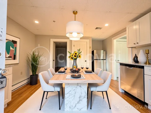 a dining room with furniture and window