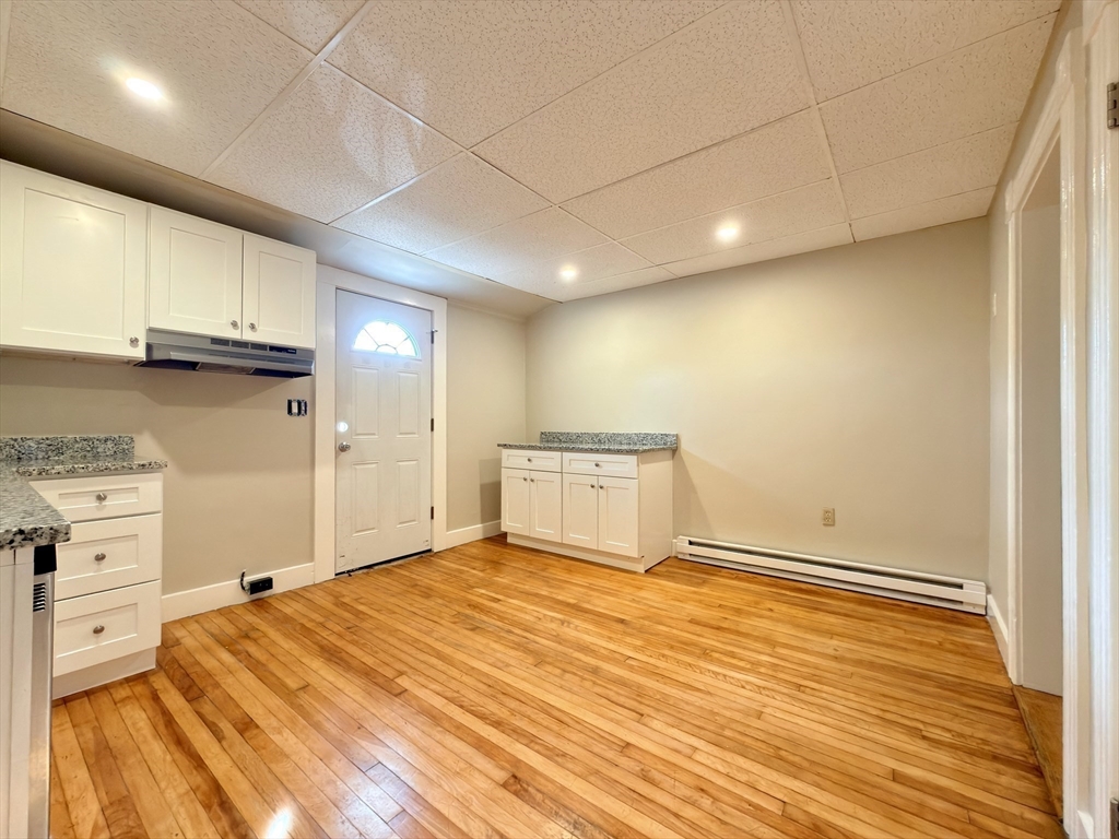 91 Alvarado Avenue, Unit 8 Worcester, MA 01604 - Photo 7 of 26 a view of a kitchen with wooden floor