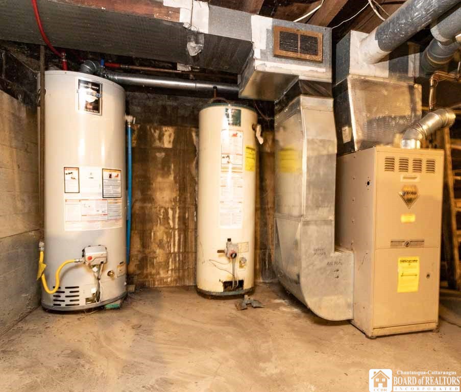 15 Robinson Street Hanover, NY 14136 - Photo 28 of 29 Gas furnace and hot water tank