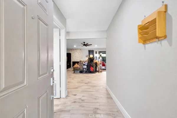 a view of a room with a furniture and entryway