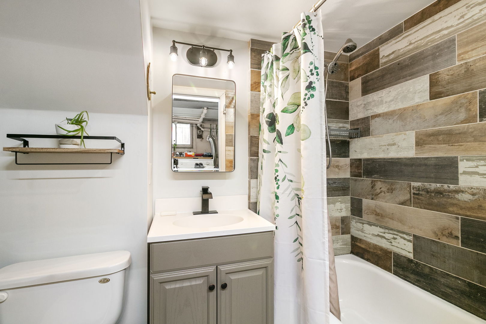 11345 South Bell Avenue Chicago, IL 60643 - Photo 19 of 28 a bathroom with a sink and a mirror
