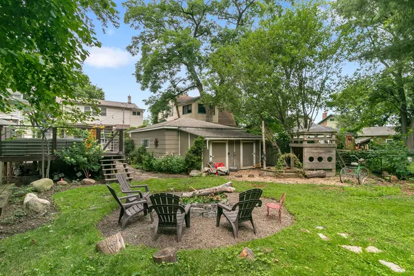a view of a house with a yard porch and sitting area