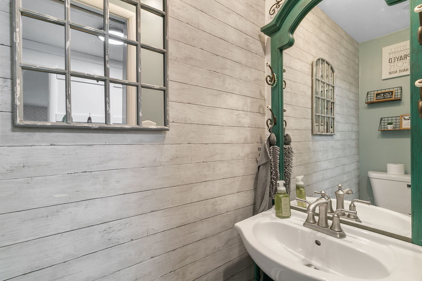 11345 South Bell Avenue Chicago, IL 60643 - Photo 5 of 28 a bathroom with a sink and a mirror