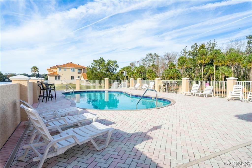 4865 South Tromp Loop Homosassa, FL 34448 - Photo 28 of 30 a view of a swimming pool with a patio