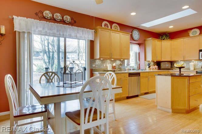 2165 Moorlands Howell, MI 48855 - Photo 17 of 36 Casual Dining Area with Doorwall to the Deck