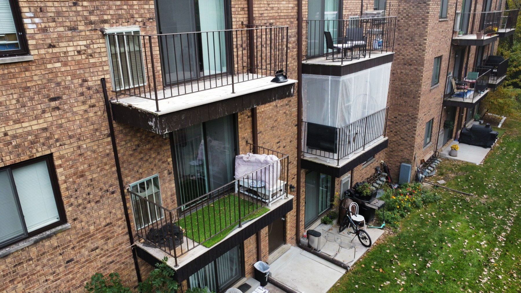 224 East Rimini Court Palatine, IL 60067 - Photo 19 of 24 a view of balcony with two chairs and potted plants