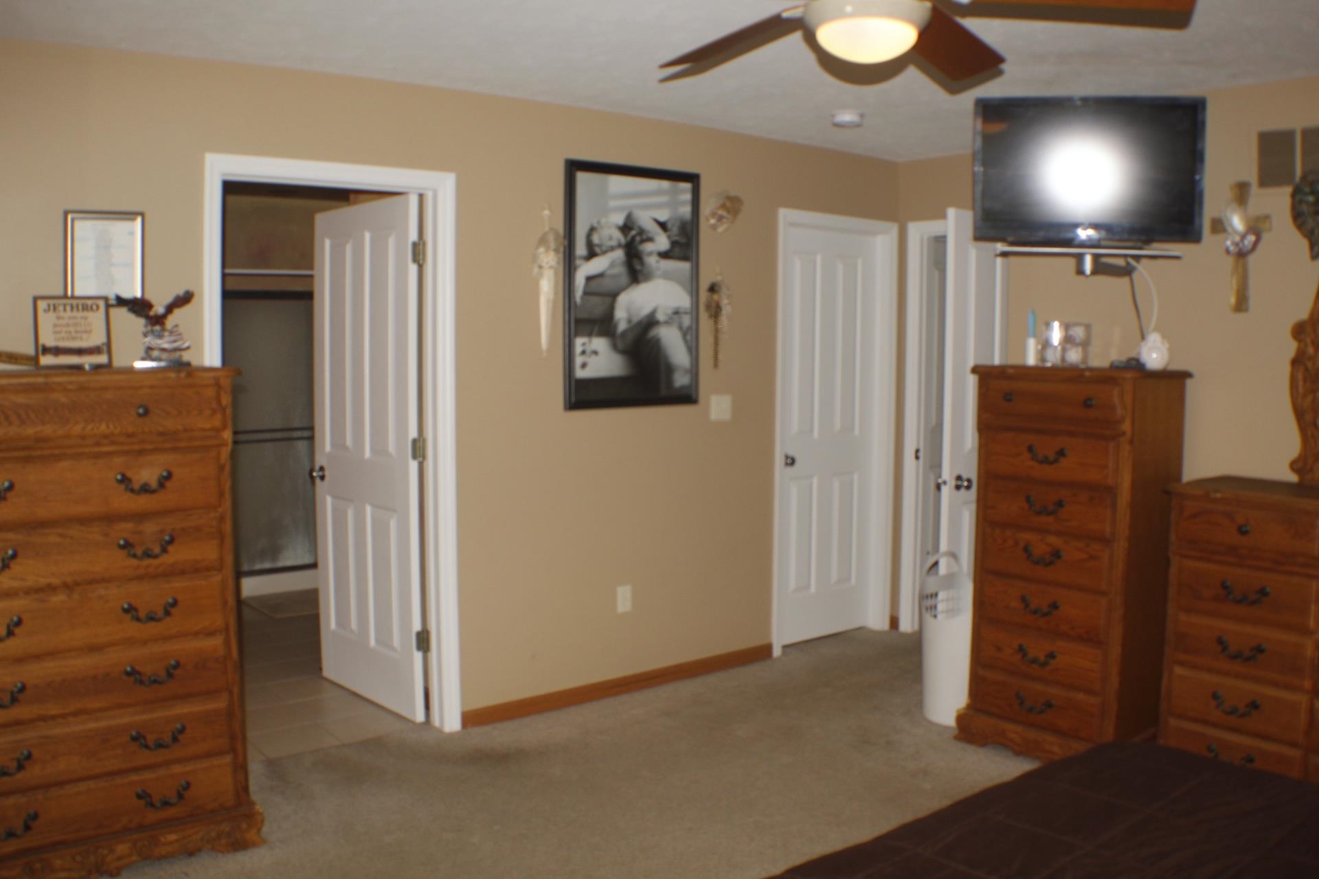 9190 North Barker Road Byron, IL 61010 - Photo 16 of 53 a view of walk in closet with cabinet