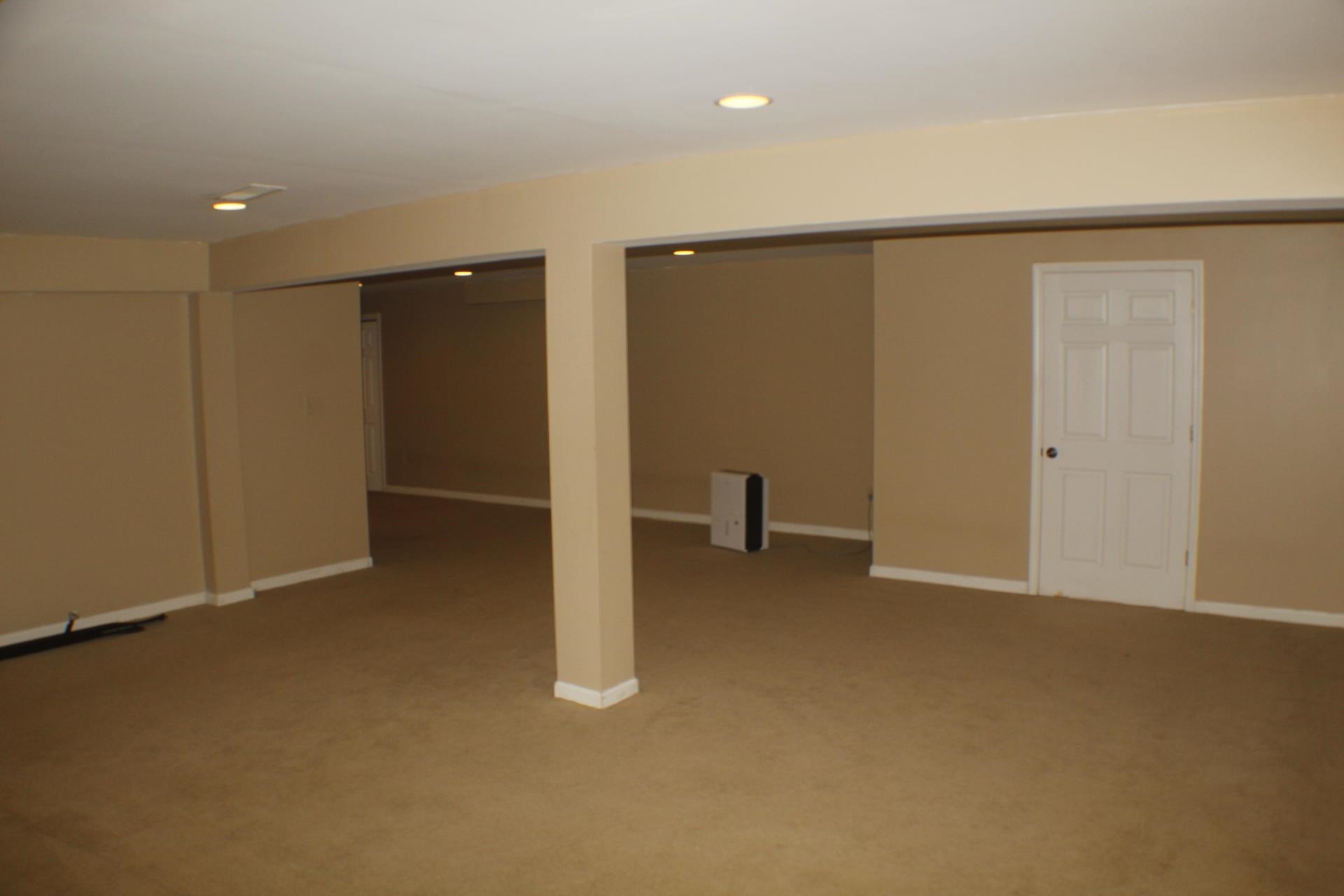 9190 North Barker Road Byron, IL 61010 - Photo 31 of 53 an empty room with a door