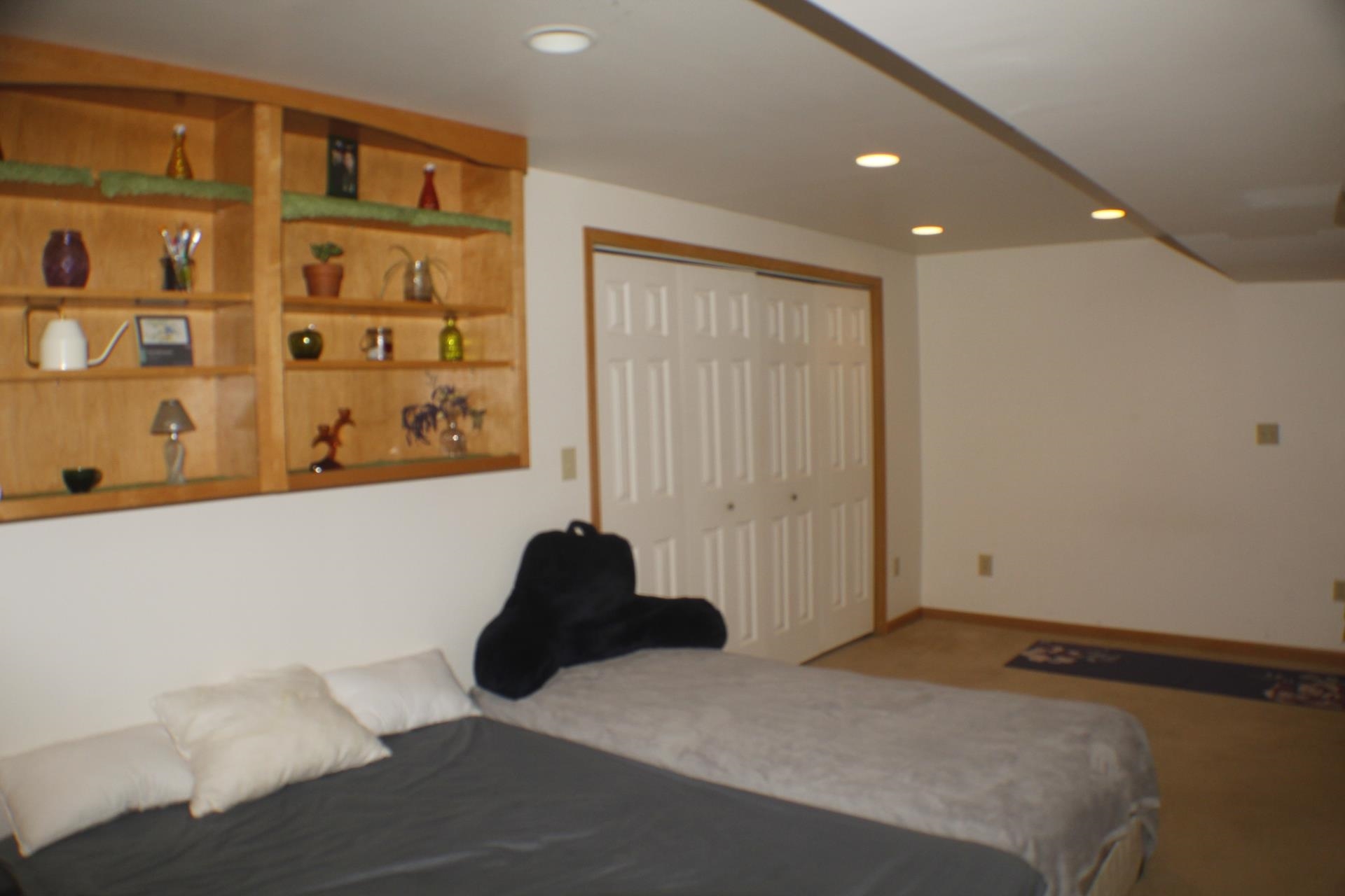 9190 North Barker Road Byron, IL 61010 - Photo 38 of 53 a bedroom with a bed and a window