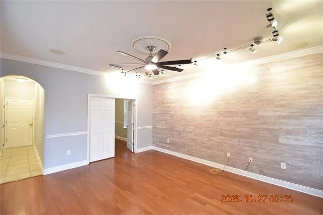 a kitchen with granite countertop cabinets and black appliances