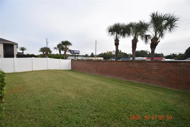 a view of a terrace with yard and lake view