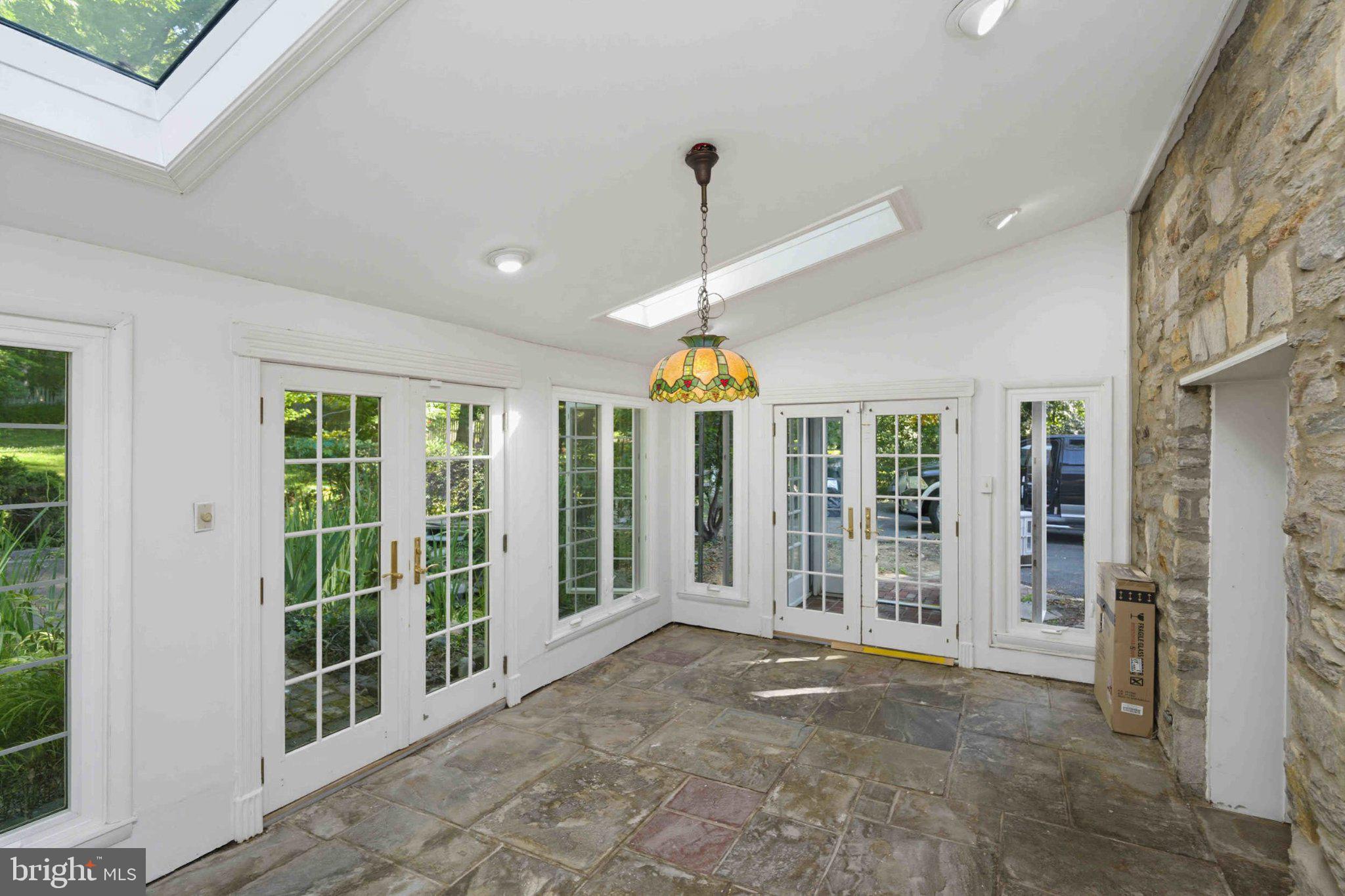 1268 Rydal Road Jenkintown, PA 19046 - Photo 10 of 31 a big room with windows and stairs