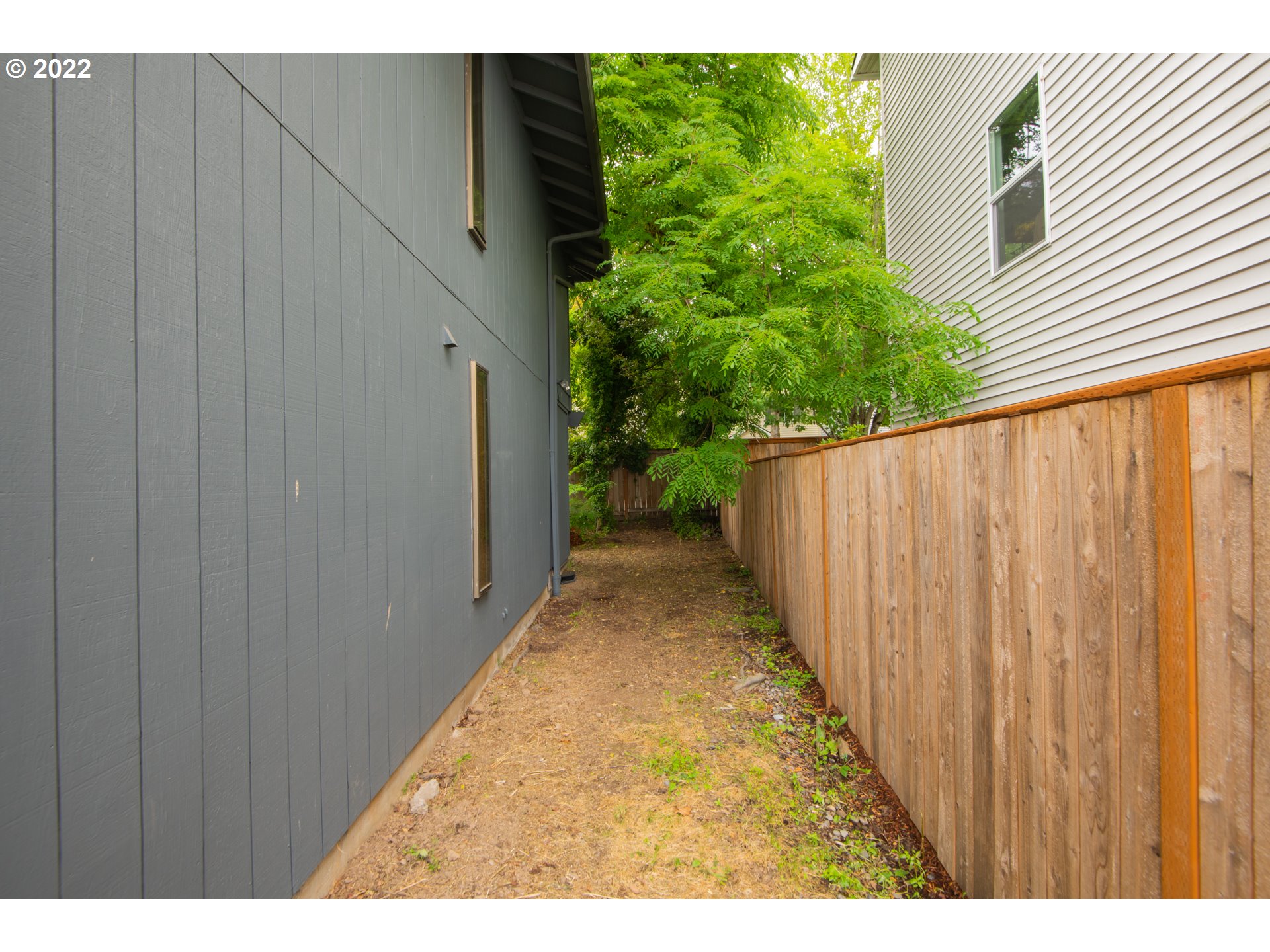 8960 Southwest Cashmur Lane Portland, OR 97225 - Photo 17 of 19 a view of a backyard with pathway