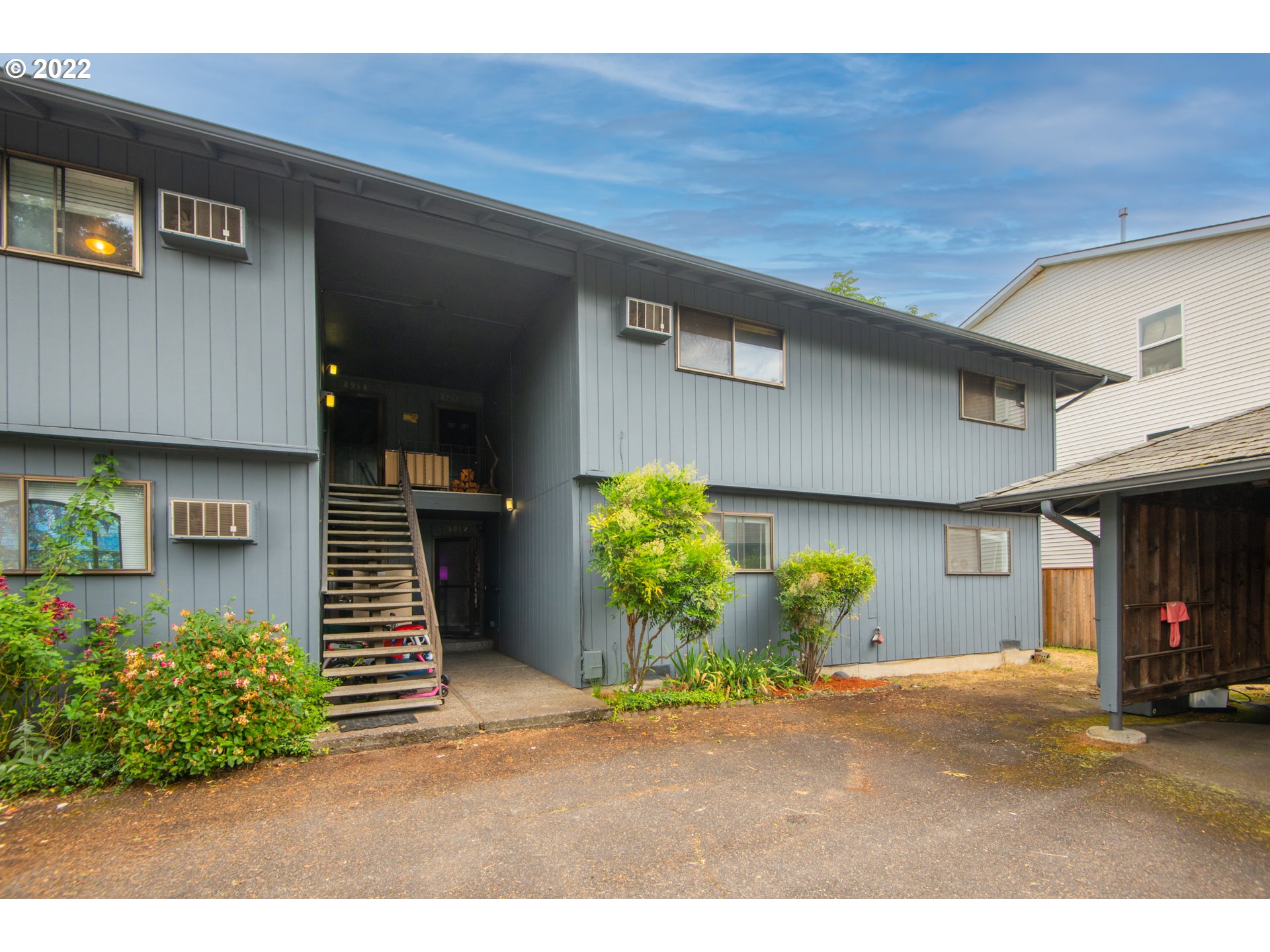 8960 Southwest Cashmur Lane Portland, OR 97225 - Photo 19 of 19 a view of a house with a garage