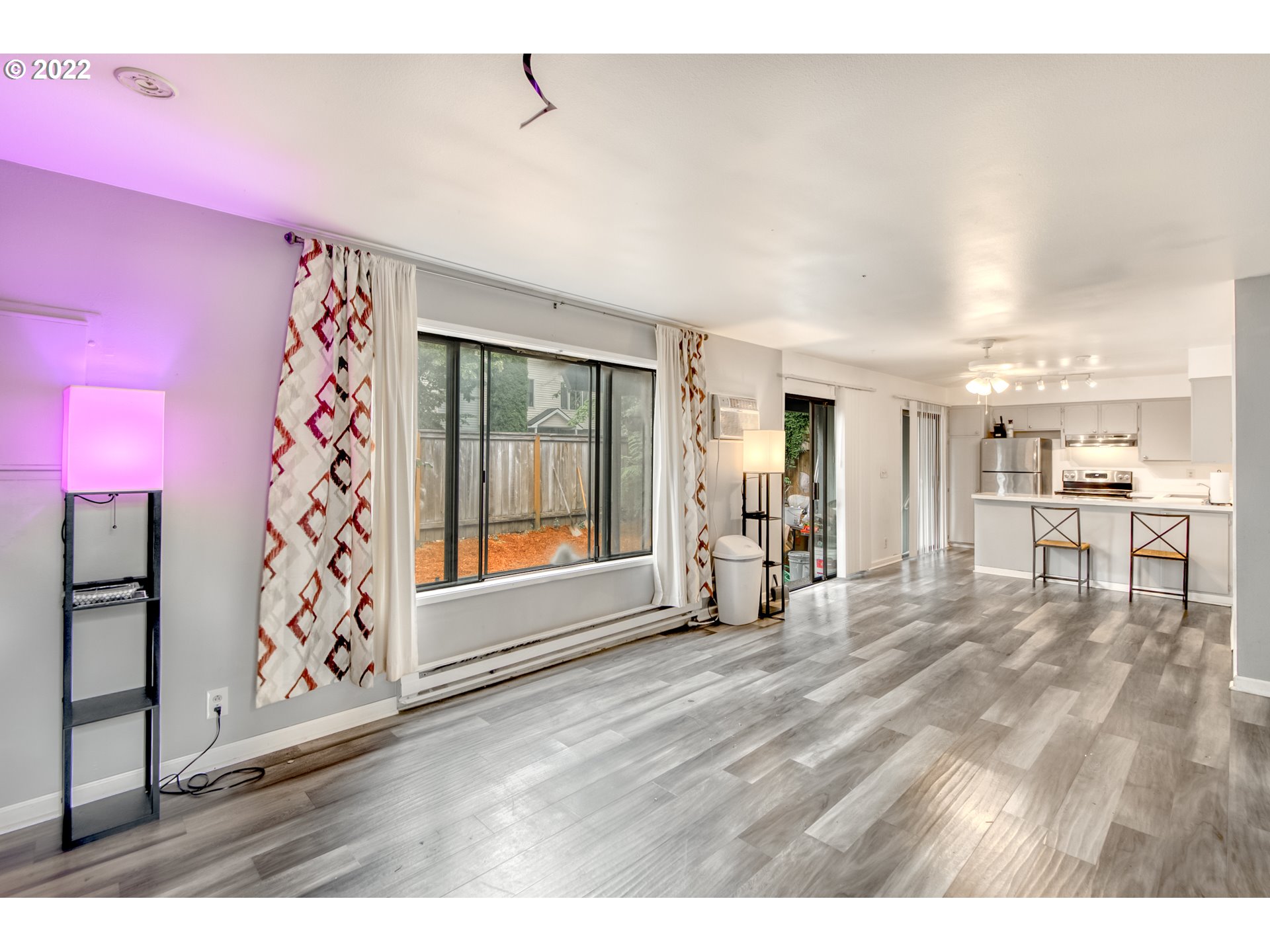 8960 Southwest Cashmur Lane Portland, OR 97225 - Photo 2 of 19 a view of a livingroom with wooden floor
