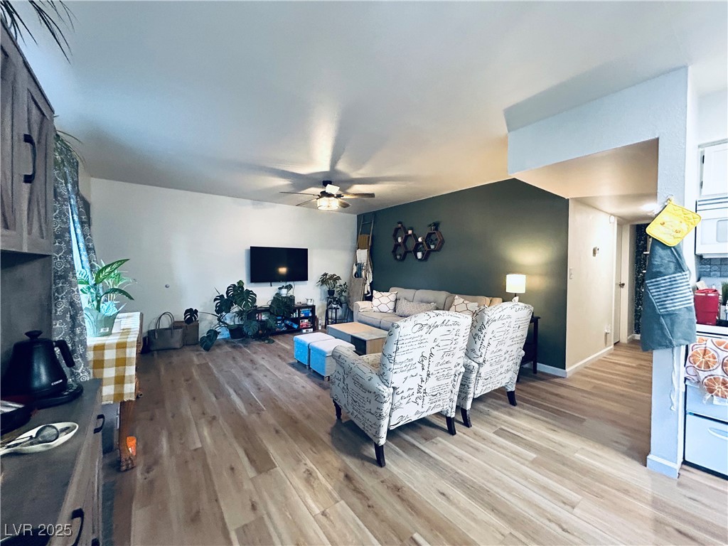 524 Fir Street, Unit 203 Boulder City, NV 89005 - Photo 2 of 7 In a separate look of the living room note the open layout that seamlessly connects to a charming kitchen.