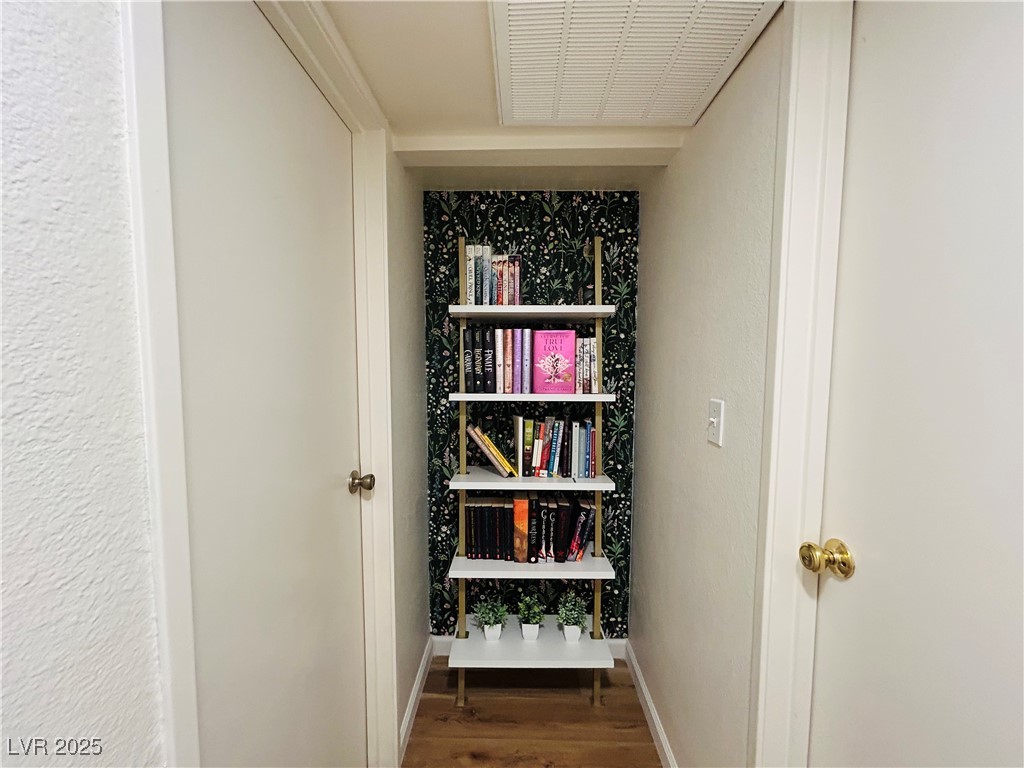524 Fir Street, Unit 203 Boulder City, NV 89005 - Photo 5 of 7 This elegant hallway boasts a floral accent wall, perfectly poised to display items that hold special meaning to you.
