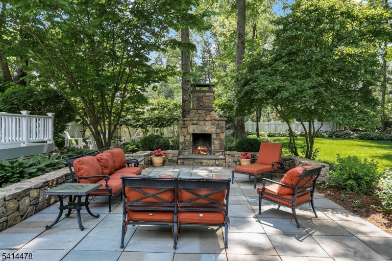 33 St Nickolas Way Bernards, NJ 07920 - Photo 36 of 50 a backyard of a house with outdoor seating