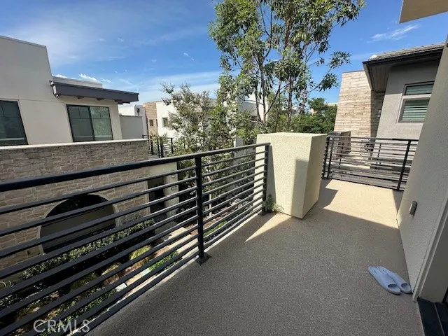 a view of a balcony with chairs