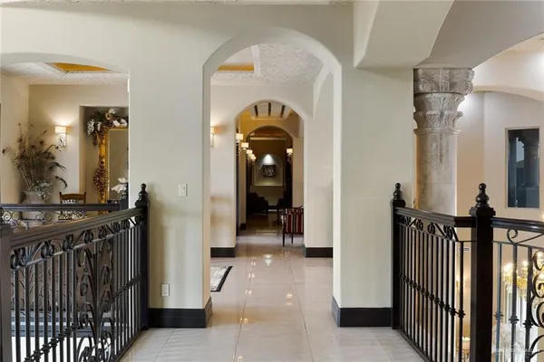 a view of a hallway view with staircase
