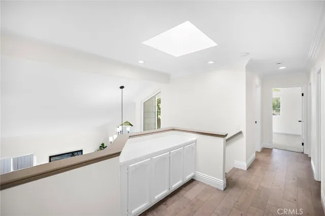 a bathroom with a granite countertop sink mirror and a bathtub