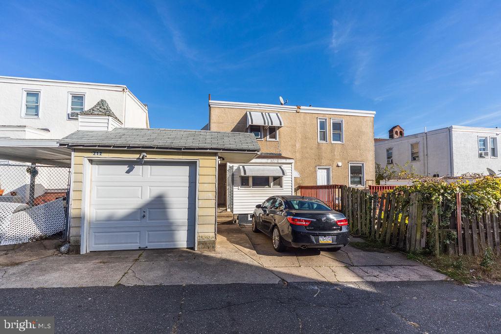 212 Heather Road Upper Darby, PA 19082 - Photo 28 of 28 a car parked in front of a building