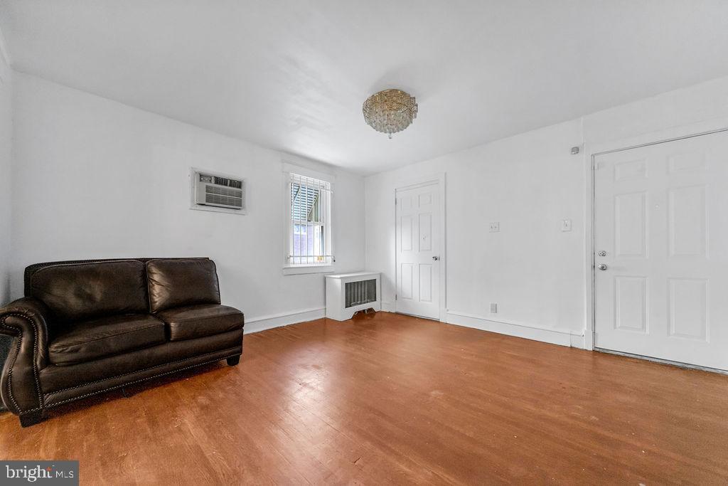 212 Heather Road Upper Darby, PA 19082 - Photo 7 of 28 a living room with furniture and a window
