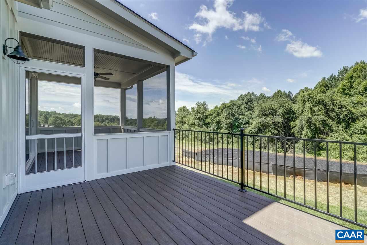 203 Guildford Farm Road Ruckersville, VA 22968 - Photo 49 of 50 a view of a house with a balcony