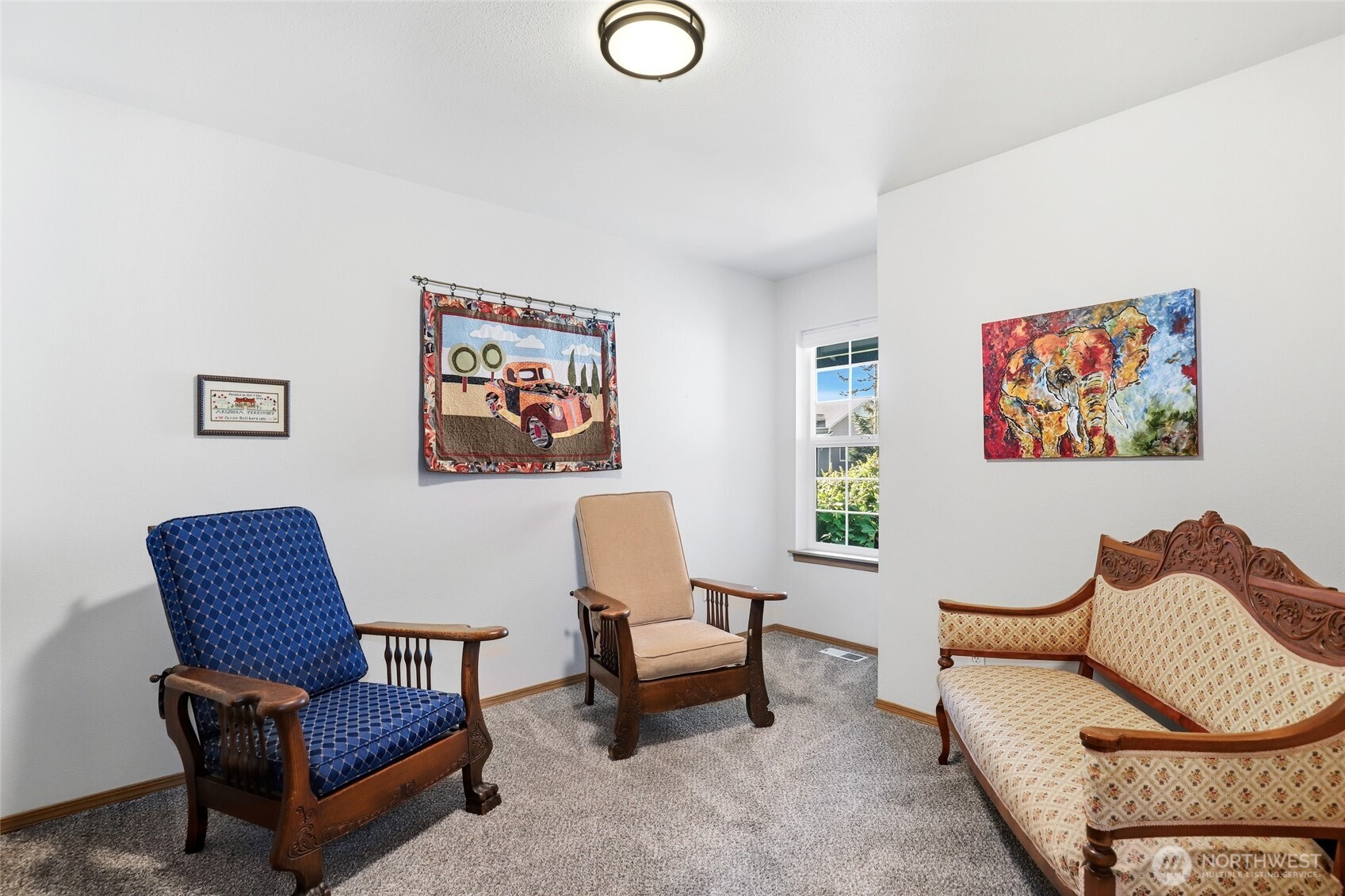 8008 188th Avenue Southwest Rochester, WA 98579 - Photo 26 of 40 a living room with furniture and a chair