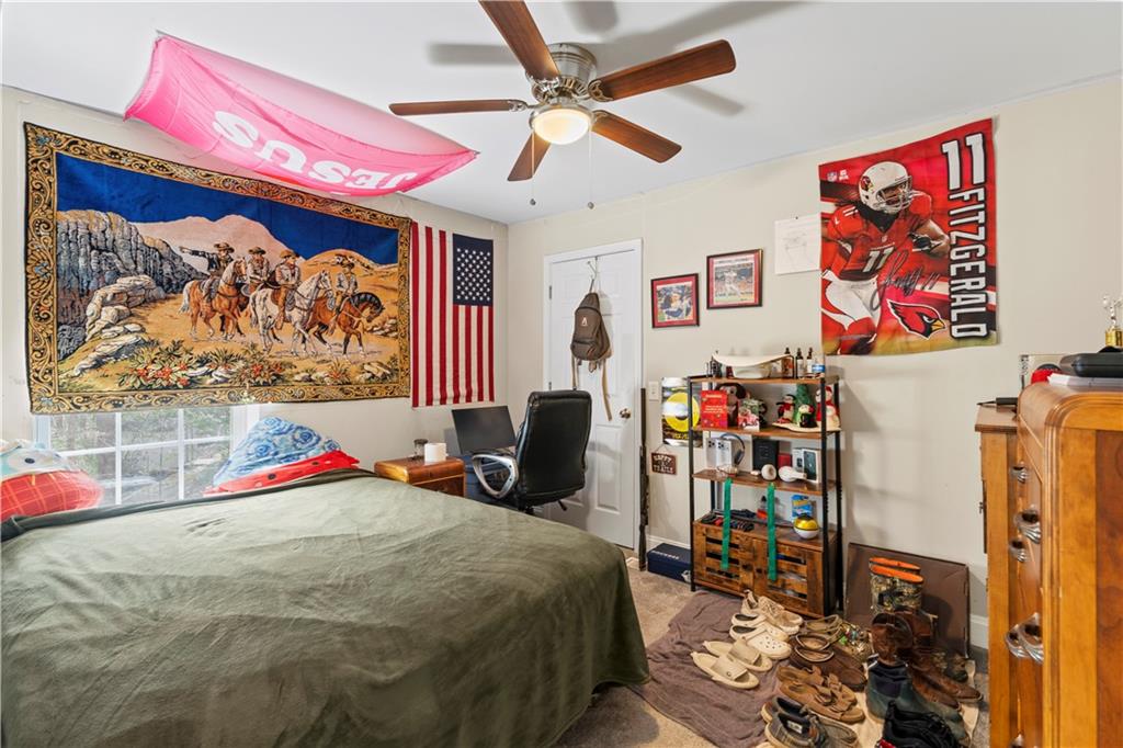3724 Lexington Court Gainesville, GA 30504 - Photo 25 of 56 a bedroom with a bed and a window