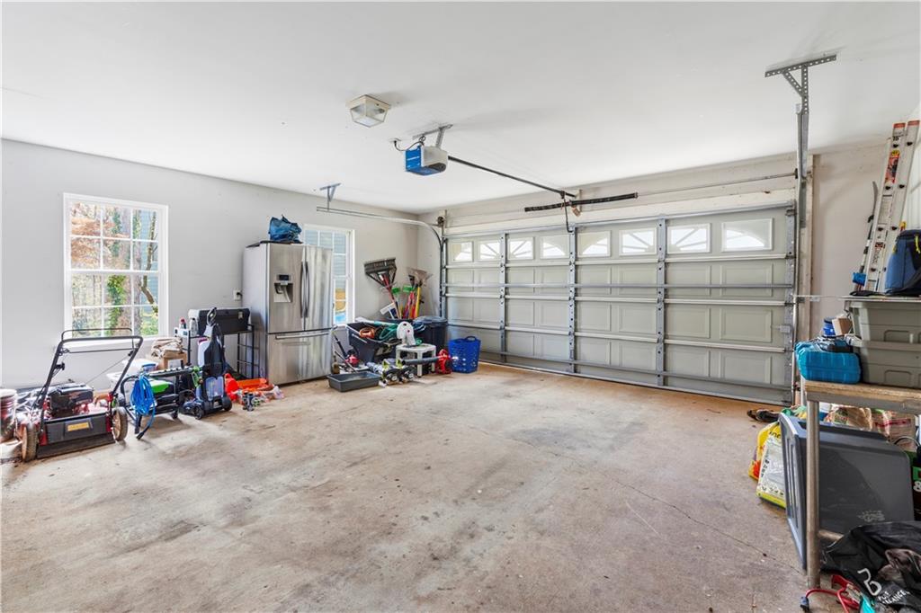3724 Lexington Court Gainesville, GA 30504 - Photo 39 of 56 a view of a garage with rack and bicycle